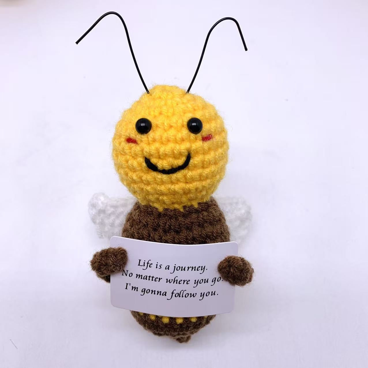 A tiny Plushie that feels cozy at the center, with a heartwarming message as its frame made to sit in a pocket, on a desk, or inside a gift box like a little daily reminder.