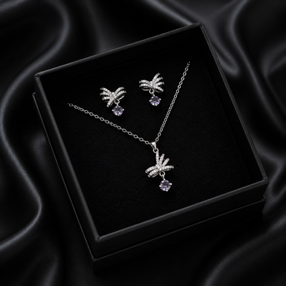 Let your style take flight with the Radiant Zephyr Set, a whimsical collection that captures the delicate beauty of a butterfly in motion. Inspired by classical bow motifs, this set blends feminine charm with a high-fashion, ethereal feeling, making it the perfect choice for those who love jewelry with a story.