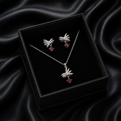 Let your style take flight with the Radiant Zephyr Set, a whimsical collection that captures the delicate beauty of a butterfly in motion. Inspired by classical bow motifs, this set blends feminine charm with a high-fashion, ethereal feeling, making it the perfect choice for those who love jewelry with a story.