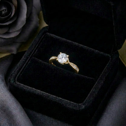 A graceful flow captured in delicate curves, Rivelle Flowelle Ring blends timeless sparkle with a soft wave silhouette. The flowing band embraces the brilliant center stone beautifully, creating an elegant piece that feels refined, romantic, and effortlessly wearable.