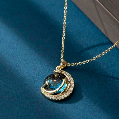 Unveil the elegance of the cosmos with the Stardust Whisper Necklace, a breathtaking creation crafted from premium titanium steel and plated with a durable titanium finish. This necklace features a mesmerizing cosmic-inspired pendant, adorned with glimmering zircon stones that catch the light from every angle.