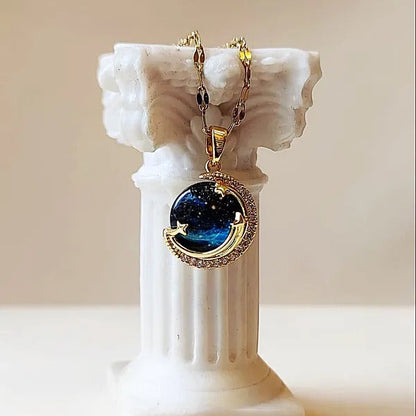 Unveil the elegance of the cosmos with the Stardust Whisper Necklace, a breathtaking creation crafted from premium titanium steel and plated with a durable titanium finish. This necklace features a mesmerizing cosmic-inspired pendant, adorned with glimmering zircon stones that catch the light from every angle.
