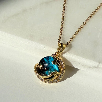 Unveil the elegance of the cosmos with the Stardust Whisper Necklace, a breathtaking creation crafted from premium titanium steel and plated with a durable titanium finish. This necklace features a mesmerizing cosmic-inspired pendant, adorned with glimmering zircon stones that catch the light from every angle.