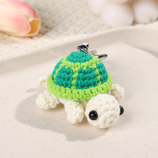 A tiny bundle of softness and charm, the Turtelle Plush Keychain brings a playful touch to your everyday essentials. With its cozy, handcrafted texture and adorable turtle design, it adds a little warmth and joy wherever it goes.