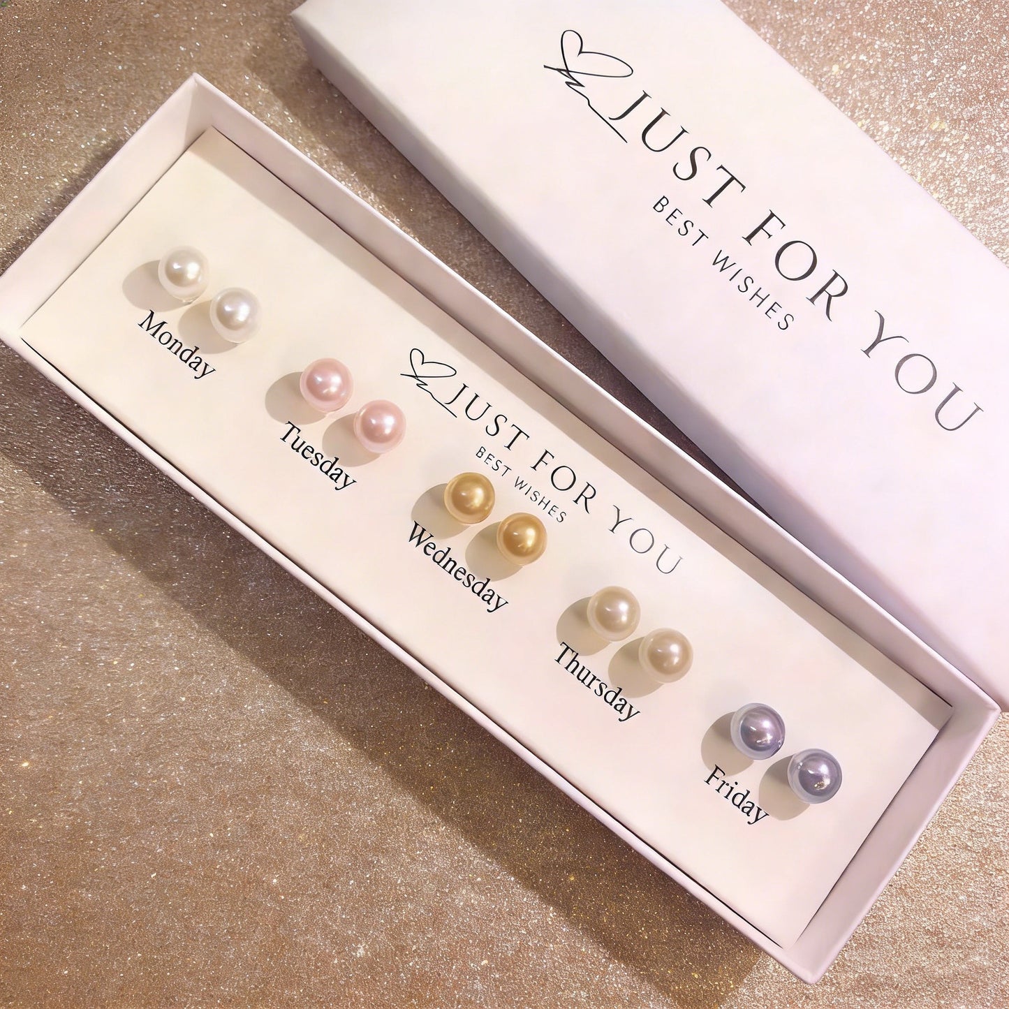 The Weeklume Pearl Set brings a charming twist to everyday elegance with a beautifully curated collection of pearl studs designed for each day of the week. Each pair features a soft, radiant pearl tone that reflects subtle sophistication and effortless style. Minimal yet versatile, this set allows you to match your mood, outfit, or occasion — adding a delicate glow to every day.