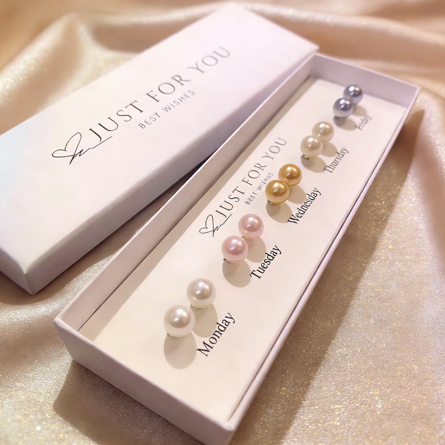 The&nbsp;Weeklume Pearl Set brings a charming twist to everyday elegance with a beautifully curated collection of pearl studs designed for each day of the week. Each pair features a soft, radiant pearl tone that reflects subtle sophistication and effortless style. Minimal yet versatile, this set allows you to match your mood, outfit, or occasion — adding a delicate glow to every day.