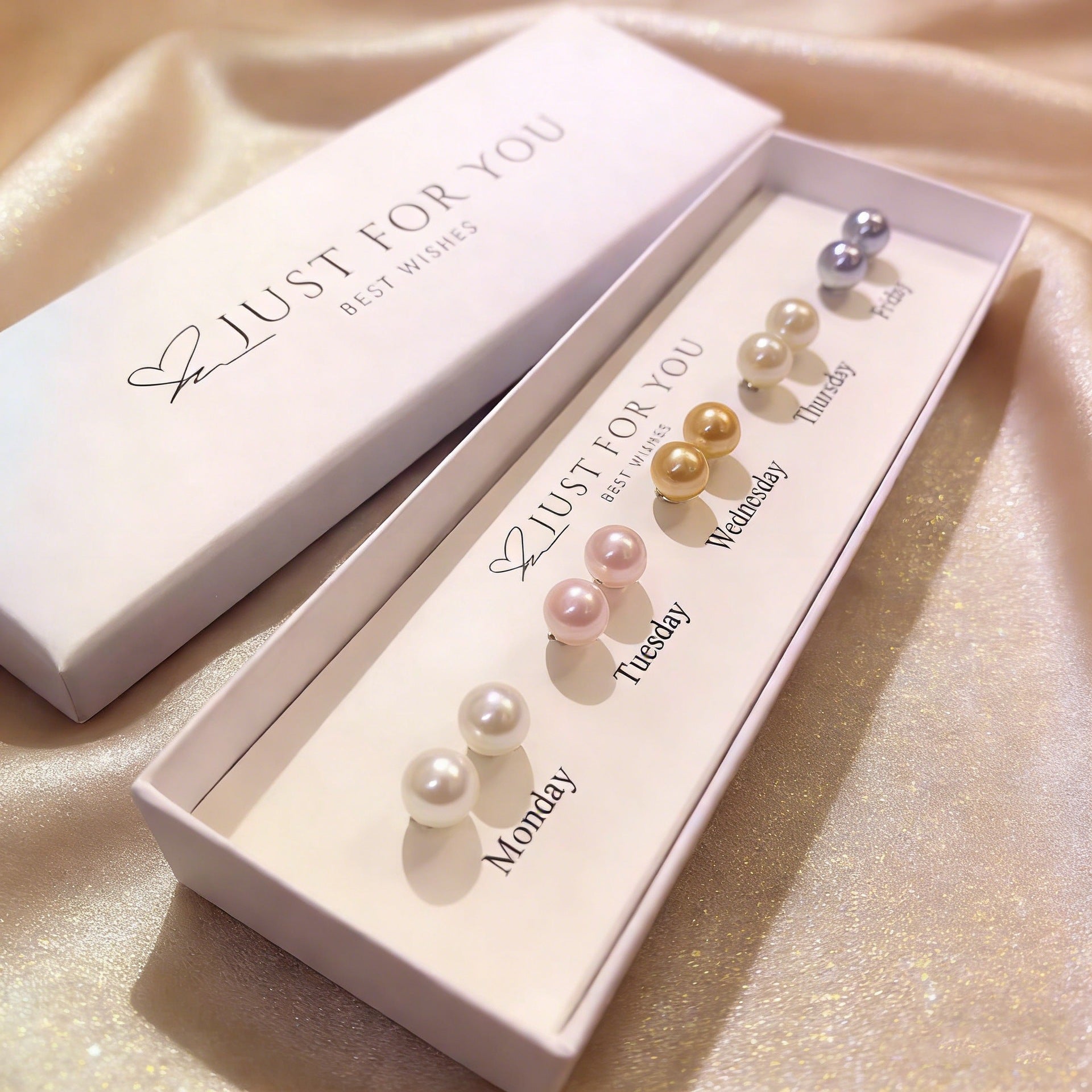 The&nbsp;Weeklume Pearl Set brings a charming twist to everyday elegance with a beautifully curated collection of pearl studs designed for each day of the week. Each pair features a soft, radiant pearl tone that reflects subtle sophistication and effortless style. Minimal yet versatile, this set allows you to match your mood, outfit, or occasion — adding a delicate glow to every day.