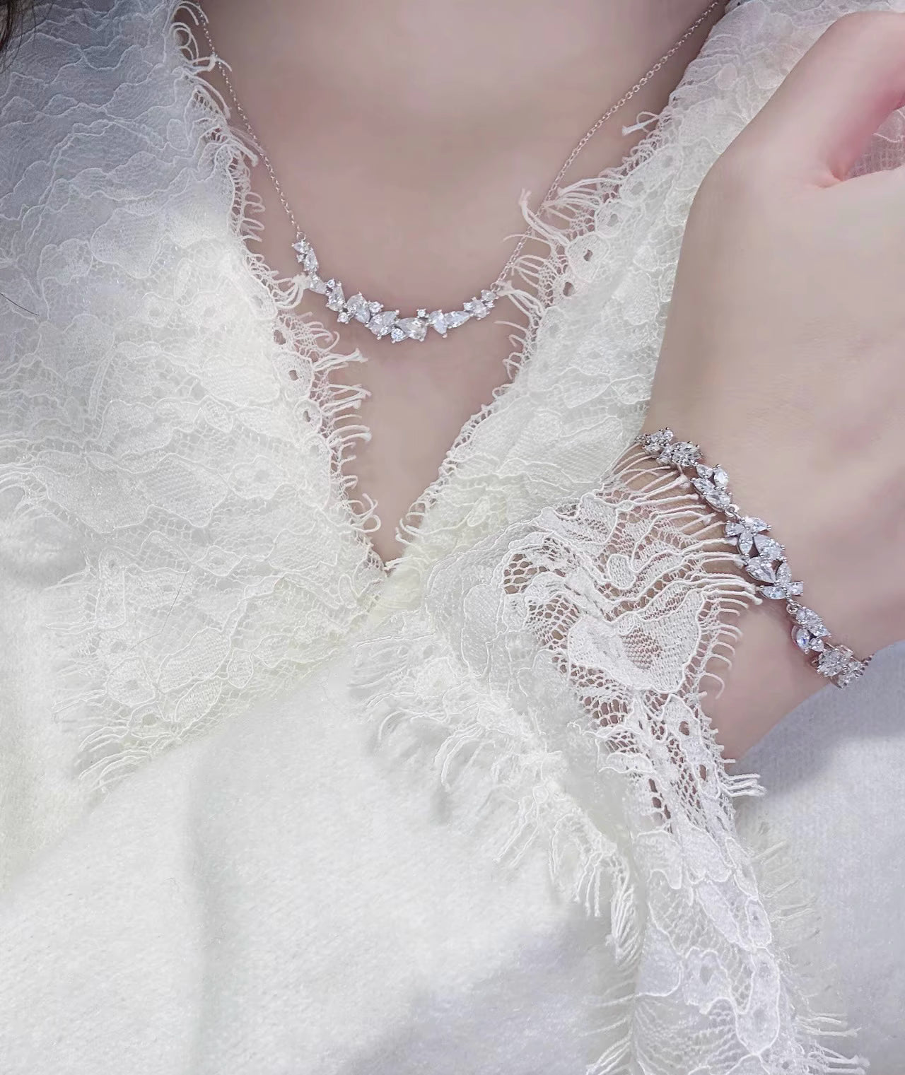 Graceful as falling petals in spring light, the Wisteria Petal Set glistens with pure sophistication. Each zircon stone is delicately cut and arranged in a floral flow, forming a soft cascade of brilliance that mirrors nature’s poetry. Crafted with premium zircon and finished with precision.