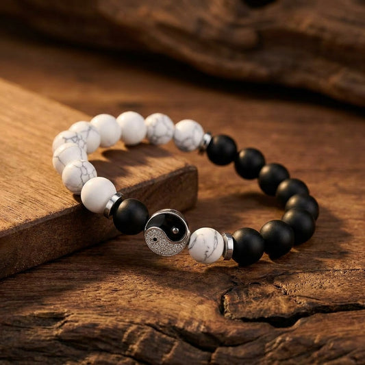 A symbol of balance and harmony, this bracelet blends contrasting tones into a sleek, meaningful design. With its black and white beads centered around the iconic yin-yang motif, it reflects a calm, balanced energy that feels both modern and timeless.